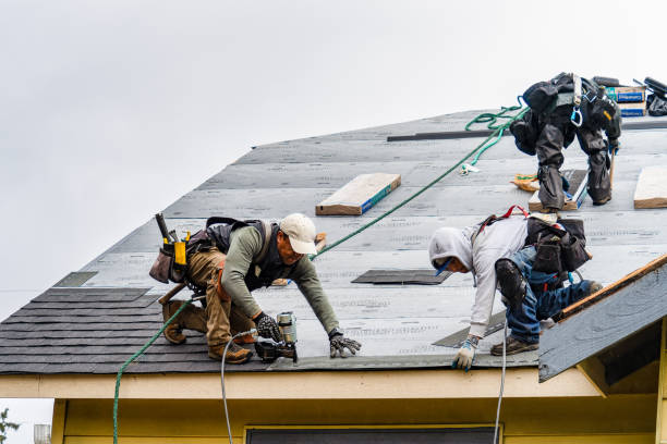 Professional Storm Damage Roof Repair technician working in Attleboro Falls, MA